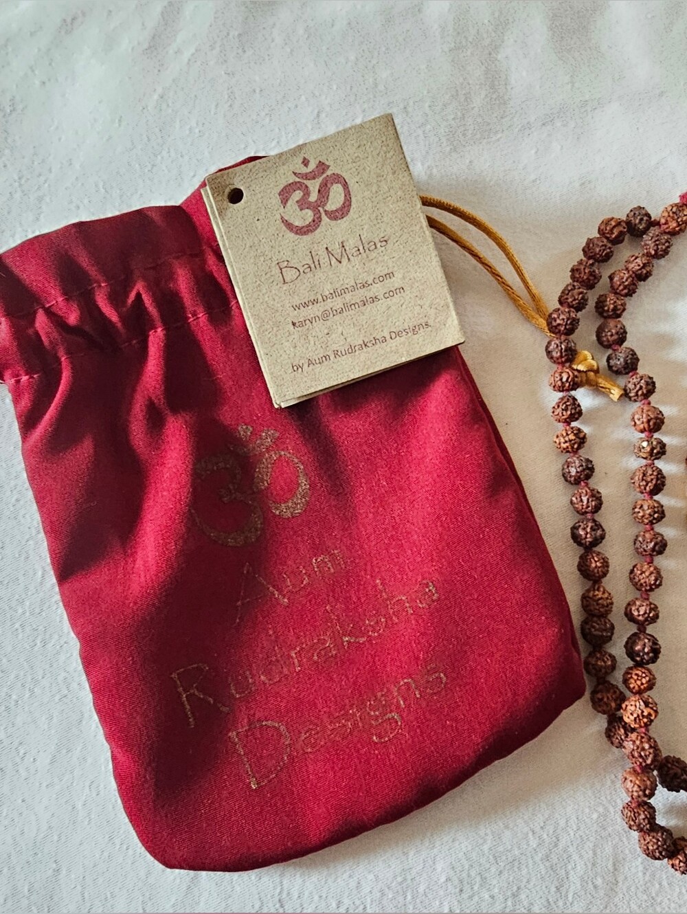 Rudraksha Beaded Mala with Red Pouch